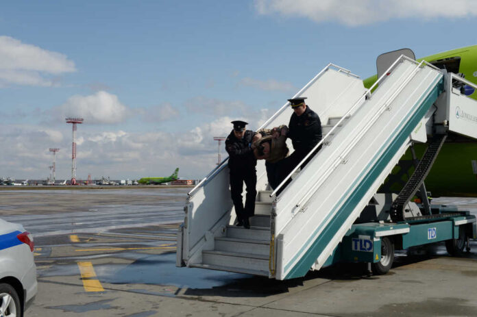 Moscow,,Russia,-,April,26,,2018:,Police,Officers,Take,Aircraft