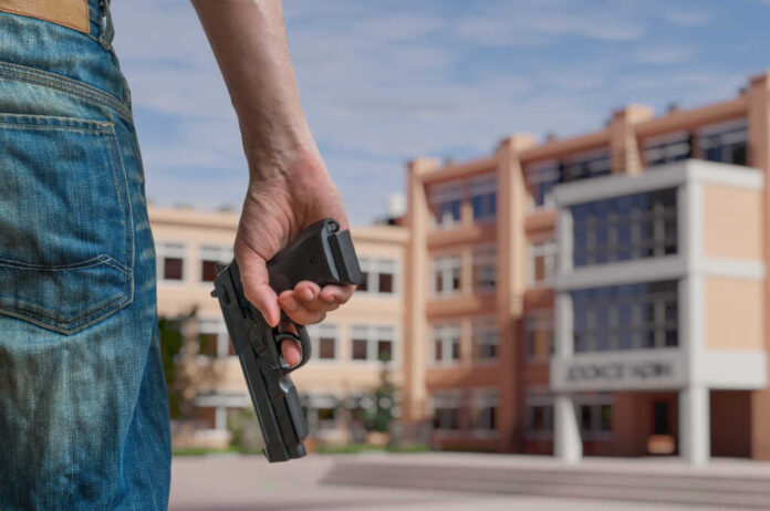 Gun,Control,Concept.,Young,Armed,Man,Holds,Pistol,In,Hand