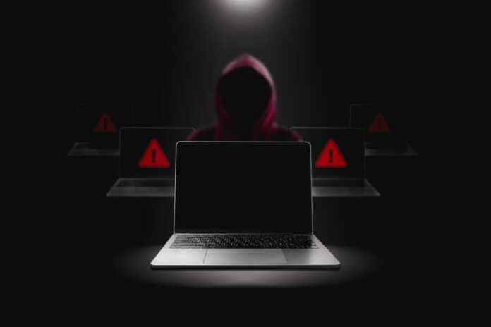 Crime,And,Attack,Technology,Concept,By,Hacker,,,Grey,Laptop